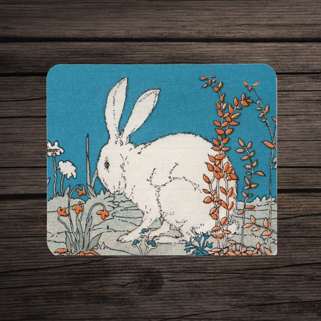 Elegant Vintage White Rabbit Mouse Pad (White rabbit sitting on grey ground with orange and white flowers on blue mousepad.)