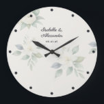 Elegant Watercolor Floral Wedding Personalized Large Clock<br><div class="desc">Add a touch of timeless romance to your home with this elegant, personalized wall clock. Featuring delicate white flowers and green leaves in a watercolor style, this botanical design perfectly captures the popular soft cottagecore and modern romantic aesthetics. The soft florals are beautifully anchored by deep blue typography and matching...</div>