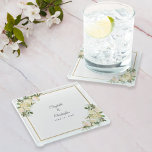 Elegant Wedding Bride & Groom Floral Roses White Glass Coaster<br><div class="desc">Chic and elegant, this romantic wedding keepsake design features romantic white vanilla wedding roses with hints of blush pink of displayed in leafy greenery on a classic white background. A trendy golden colour square frame provides a sparkling touch. Personalize wedding details with your names and wedding date in elegant and...</div>
