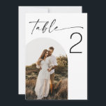 Elegant Wedding | Minimalist Photo Table Number<br><div class="desc">Create an elegant modern look for your reception with this minimalist wedding table number featuring your photo and a large easy to read number. Upload your couple photo and change the table number to match your seating plan. Clean black script “Table” paired with a modern numeral makes this design perfect...</div>
