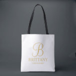 Elegant White and Gold Personalized Bridesmaid Tote Bag<br><div class="desc">Elegant Personalized Bridesmaid Gifts featuring personalized monogram in gold elegant script font style with bridesmaid's name and title in gold classic serif font style. Also perfect for Maid of Honour, Flower Girl, Mother of the Bride and more. Please Note: The foil details are simulated in the artwork. No actual foil...</div>
