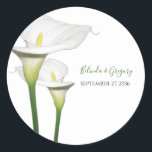 Elegant White Calla Lilies Wedding  Classic Round Sticker<br><div class="desc">This elegant floral design features white calla lilies. The beautiful white calla lilies are complete with their green stems. The bride's and groom's names are colour matched to the green stems of the calla lily flower. This is the perfect elegant floral wedding design ideal for any wedding theme. Elegant calla...</div>