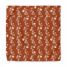 Elegant White Floral Vine Pattern on Burnt Orange
