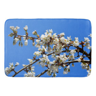 Elegant white flowering blossoms  bath mat