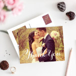 Elegant White Script Wedding Photo Thank You Postcard<br><div class="desc">Classic wedding thank you post card template features a photo on the front and back, "Thank You" in an elegant white script font, and custom text thank you message that can be personalized. White background on the back of the card can be customized to another color via Customize it /...</div>