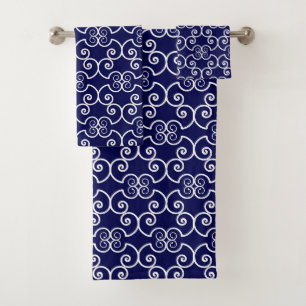 Elegant white spiral design pattern on navy blue bath towel set