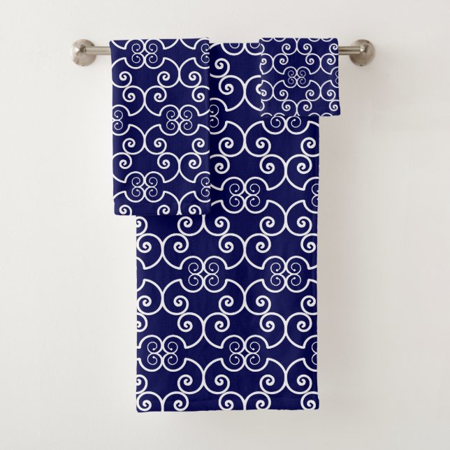 Elegant white spiral design pattern on navy blue bath towel set (Insitu)