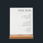 Elegant White Typographic Acrylic Sign<br><div class="desc">This acrylic sign features a clean and modern layout, showcasing a well-organized menu for "The Bar" with categories like Beer, Wine, and Spirits. The design employs a minimalist color palette of black text on a white background, creating an elegant and sophisticated look. The typography is simple yet stylish, enhancing readability...</div>
