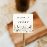 Elegant Wildflower Meadow Cream Wedding Square Sticker<br><div class="desc">Elegant floral wedding stickers featuring a bottom border of watercolor wildflowers and foliage in shades of pink, yellow, purple, blue, and green with a cream background. Personalize the wildflower wedding stickers with your names or custom text. The personalized wildflower wedding stickers are perfect for sealing wedding envelopes, favour bags, and...</div>