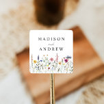 Elegant Wildflower Meadow Wedding Square Sticker<br><div class="desc">Elegant floral wedding stickers featuring a bottom border of watercolor wildflowers and foliage in shades of pink, yellow, purple, blue, and green on a white background. Personalize the wildflower wedding stickers with your names or custom text. The personalized wildflower wedding stickers are perfect for sealing wedding envelopes, favour bags, and...</div>