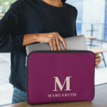Elegant Wine Red Monogram Laptop Sleeve<br><div class="desc">Elegant Wine Red Monogram Laptop Sleeve Protect your laptop with this bright wine red and beige font laptop sleeve. Easily personalize it with your own name ( or any other name) by click on "PERSONALIZE THIS TEMPLATE" button. This laptop sleeve is for those who want to protect the laptop with...</div>
