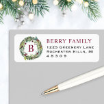 Elegant Winter Greenery Burgundy Monogram Wreath<br><div class="desc">Dress up your envelopes in style this holiday season!  This Christmas return address label features a winter floral greenery watercolor wreath framing a custom burgundy / wine red monogram initial along with elegant burgundy red last name text and dark grey return address text that can be personalized.</div>