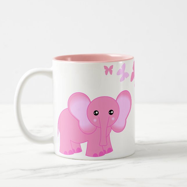 Éléphant de bébé et tasse roses mignons de (Gauche)