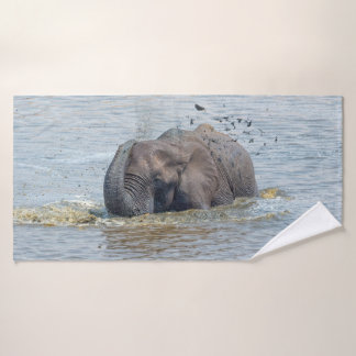 Elephant enjoying a bath towel set