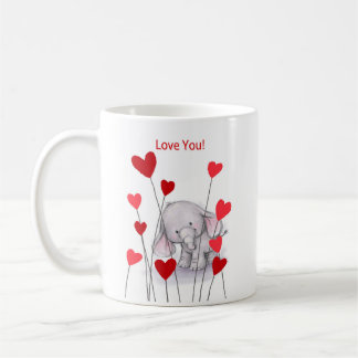 Éléphant mignon avec la tasse rouge de coeurs