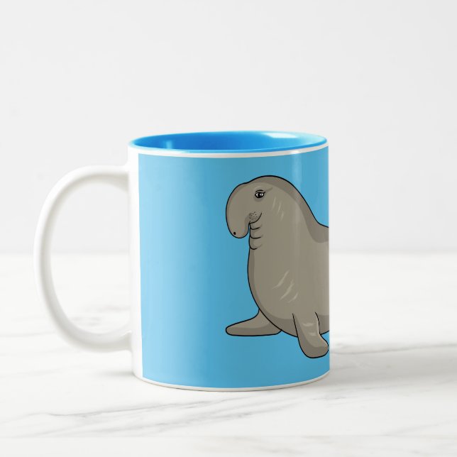 Elephant seal cartoon illustration Two-Tone coffee mug (Left)