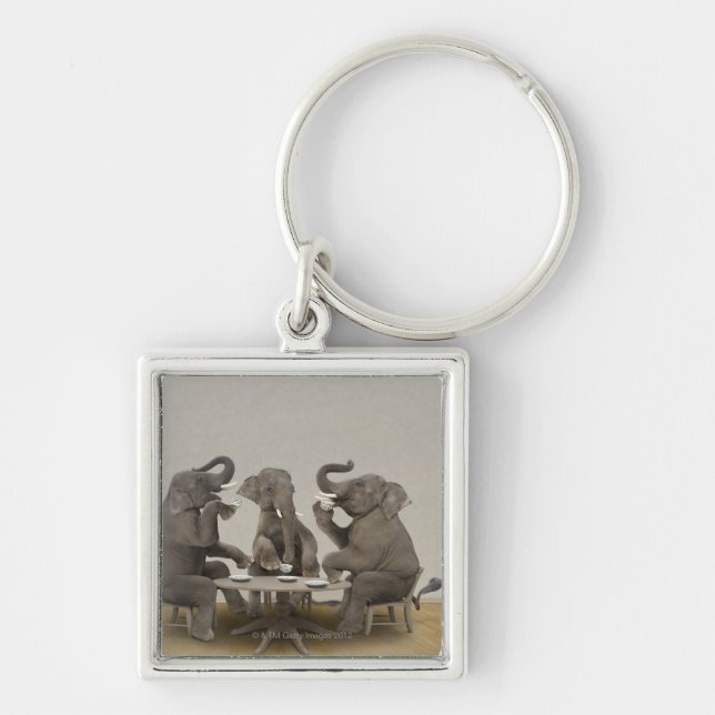 Elephants having tea party keychain (Front)