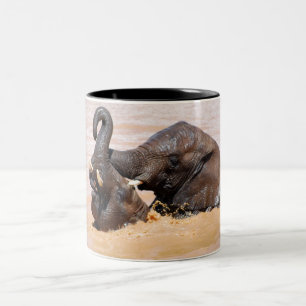Elephants water world Two-Tone coffee mug