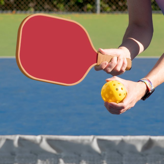 Elevate Your Design a Red Background and White  Pickleball Paddle (Insitu)