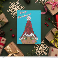 Elf wearing a Red Chile Santa Hat with a Zia
