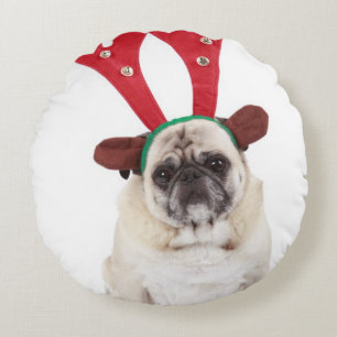 Embarrassed looking Pug wearing Reindeer Antlers Round Pillow