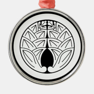 Embracing japanese gingers in circle metal ornament