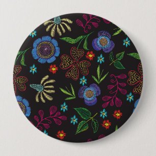 embroidered brooch with flowers on a black backgro 4 inch round button