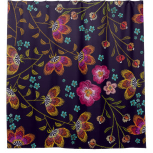 Embroidered flowers: fashion seamless pattern
