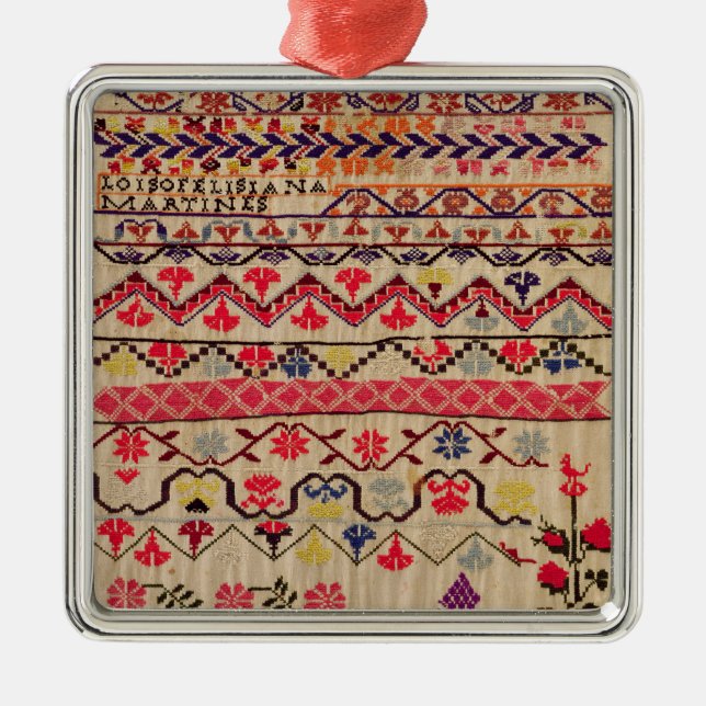 Embroidery sampler metal ornament (Front)