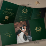 Emerald & Gold Monogram Photo QR Code RSVP Details Tri-Fold Card<br><div class="desc">The centerpiece of this romantic, glamourous wedding design is the classic traditional monogram . It features the couple's initials surrounded by a crest of leafy botanicals and branches, along with a couple's photo that adds elegance and beauty to the card—all in deep emerald green and gold-tone colours. Easily personalize your...</div>