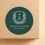 Emerald Green Crest Modern Monogram Wedding  Classic Round Sticker<br><div class="desc">Add a touch of luxury to your wedding with the Emerald Green Crest Modern Monogram Wedding Classic Round Sticker. Featuring a rich emerald green background, a refined crest design, and a personalized monogram, this sticker is perfect for enhancing your wedding invitations, favours, or decor. Its elegant and timeless style makes...</div>