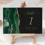 Emerald Green Gold Agate Dark Wedding Table Number<br><div class="desc">The left-hand edge of this elegant modern wedding table number card features an emerald green watercolor agate border trimmed with faux gold glitter. The customizable text combines gold-coloured handwriting,  italic and copperplate fonts on an off-black background.</div>