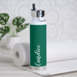 Emerald Green Personalized Wedding Bridesmaid Water Bottle<br><div class="desc">Gift your wedding bridesmaid or maid of honour with this trendy, vacuum Insulated water bottle that features her name in white, stylized script on an emerald green colour background designed to match your wedding colour scheme. Personalize bottle by editing and replacing name with your own as desired. Select your water...</div>