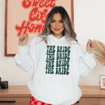 Emerald Green Trendy Groovy Disco Bride Custom Hoodie<br><div class="desc">Are you planning the perfect bachelorette party for your soon-to-be bride? Well, this personalized emerald green hoodie sweatshirt is just what you need! Not only does it look great, but it will also come in handy during the rehearsal dinner and wedding day. Plus, who doesn't love a good bridal party...</div>