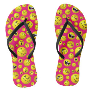 Emoji balls on magenta background flip flops