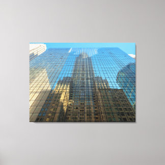 Empire State Building Reflection on Glass Building Canvas Print