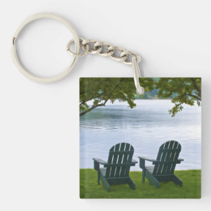 Empty Adirondack Chairs facing a Lake Keychain