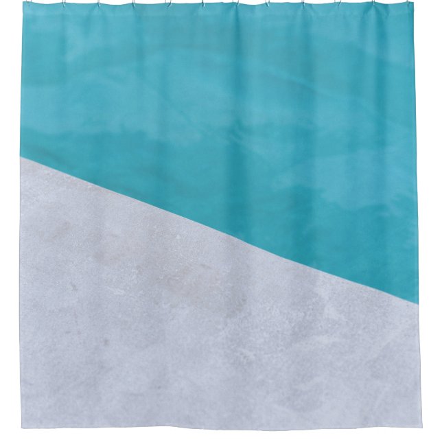 Empty gray floor beside pool (Front)