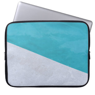 Empty gray floor beside pool laptop sleeve