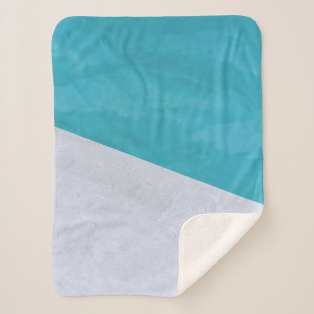 Empty grey floor beside pool sherpa blanket (Front)