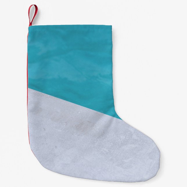 Empty grey floor beside pool small christmas stocking (Front)