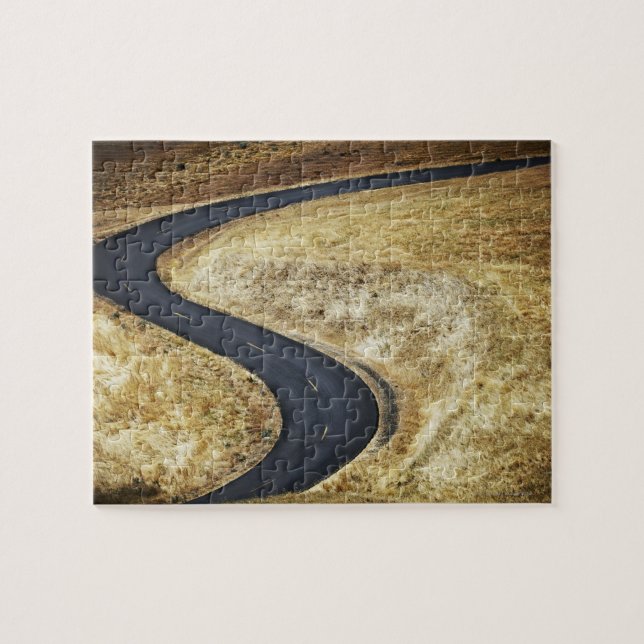 Empty winding paved road jigsaw puzzle (Horizontal)