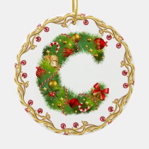 En Céramique ornement décoré d'un monogramme initial de Noël