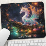 Enchanted Forest Dragon Personalized Mouse Pad<br><div class="desc">Transform your workspace into a magical realm with this enchanting mouse pad featuring a majestic dragon nestled within an ethereal forest. The vibrant colours and intricate details bring the scene to life, inspiring creativity and wonder. The smooth surface ensures precise mouse movements while the non-slip backing keeps it securely in...</div>