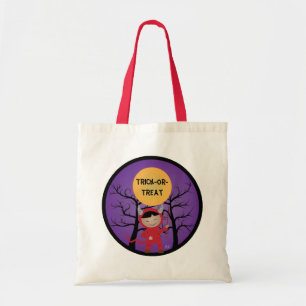 Enfant dans le costume diable sac à coller ou à tr