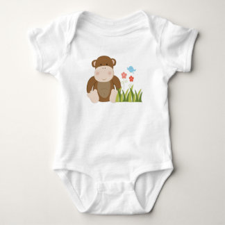 Enfant en bas âge de singe de jungle et barboteuse