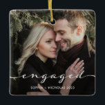 Engaged | Simple Script and Two Photos Ceramic Ornament<br><div class="desc">This simple and stylish holiday ornament for your first Christmas engaged features trendy script typography over two of your favourite personal couples photos. The perfect keepsake to show off your wedding engagement photos while decorating for the holidays.</div>