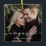 Engaged | Simple Script and Two Photos Ceramic Ornament<br><div class="desc">This simple and stylish holiday ornament for your first Christmas engaged features trendy script typography over two of your favourite personal couples photos. The perfect keepsake to show off your wedding engagement photos while decorating for the holidays.</div>