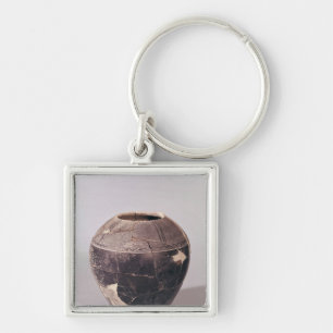 Engobe vase decorated with undulating lines keychain