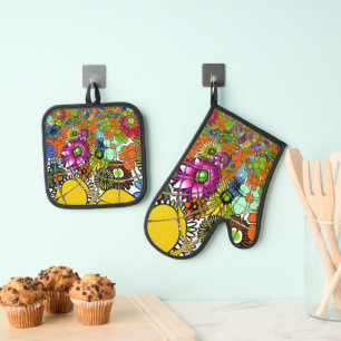 Ensemble De Gant De Cuisine Et De Manique Art vectoriel floral coloré